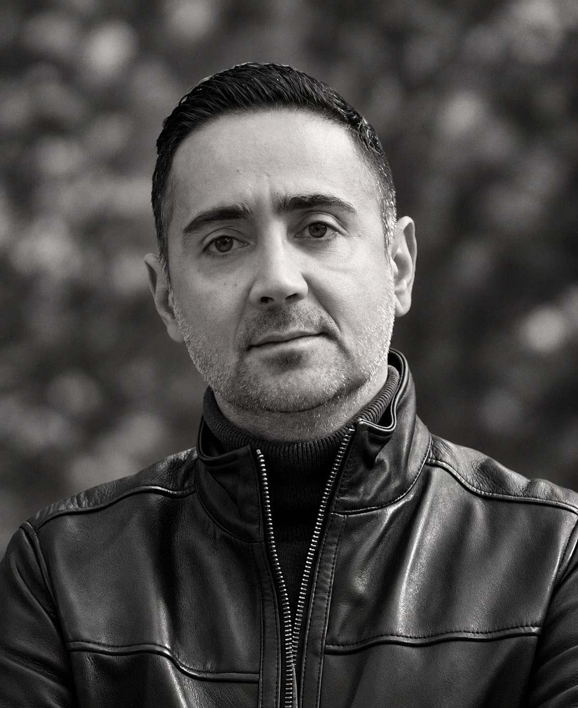 Black-and-white portrait of Ahad Afazeli, Toronto lead for FOXTER